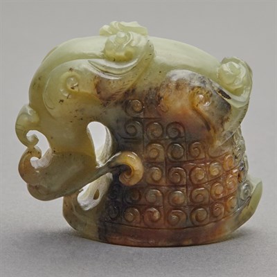 Lot 150 - Chinese Celadon and Russet Jade Rhyton Cup The...