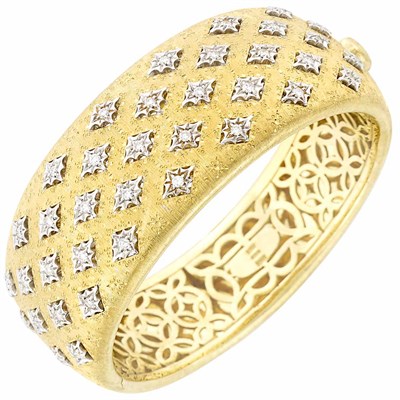 Lot 645 - Two-Color Gold and Diamond Cuff Bangle Bracelet