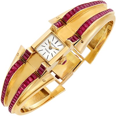 Lot 187 - Gold and Synthetic Ruby Bangle-Watch, Cartier, Paris