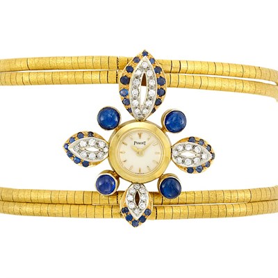 Lot 524 - Four Strand Gold, Diamond and Sapphire Wristwatch, Piaget