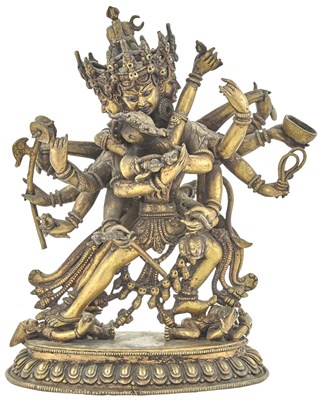 Lot 341 - A Large Tibetan Bronze Tantric Grouping of...