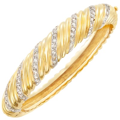 Lot 250 - Two-Color Gold and Diamond Bangle Bracelet