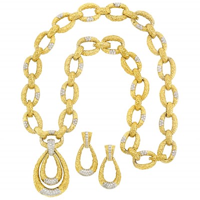Lot 377 - Two-Color Gold and Diamond Pendant-Necklace/Bracelet Combination and Pair of Pendant-Earrings