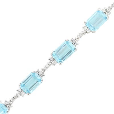 Lot 455 - White Gold, Blue Topaz and Diamond Bracelet