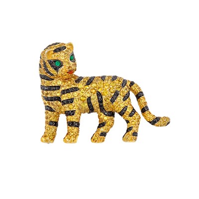 Lot 523 - Two-Color Gold, Yellow Sapphire, Black Diamond, Cabochon Emerald and Carnelian Tiger Clip-Brooch