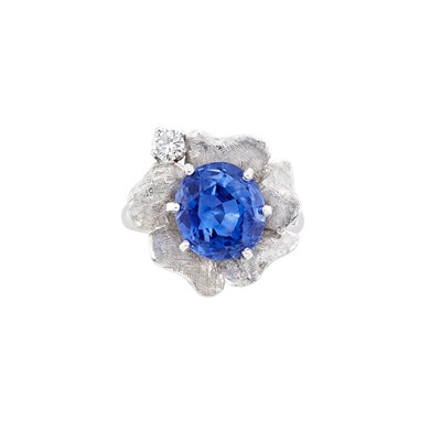Lot 192 - White Gold, Sapphire and Diamond Flower Ring