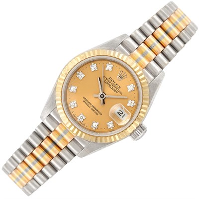 Lot 169 - Lady's Tricolor Gold and Diamond 'Tridor' Oyster Perpetual DateJust Wristwatch, Rolex, Ref. 69179B
