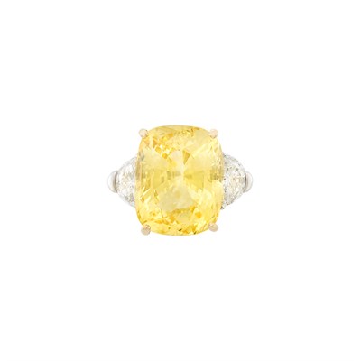 Lot 456 - Platinum, Gold, Yellow Sapphire and Diamond Ring