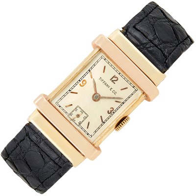Lot 106 - Gentleman's Two-Color Gold 'Top Hat' Wristwatch, Tiffany & Co., C.H. Meylan Co.