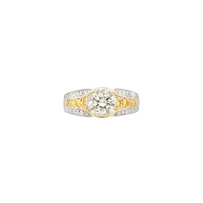 Lot 216 - Two-Color Gold, Diamond and Yellow Diamond Ring