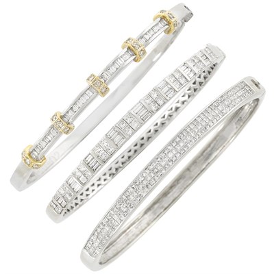 Lot 198 - Three White Gold and Diamond Bangle Bracelets