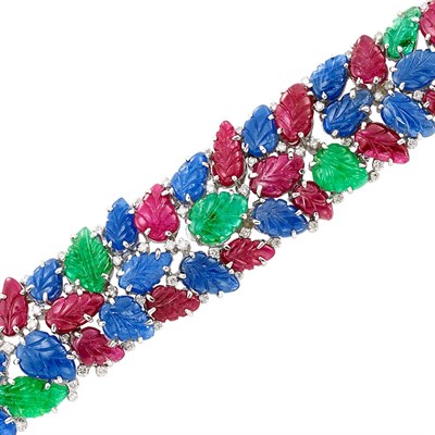 Lot 350 - White Gold, Carved Ruby, Emerald and Sapphire and Diamond 'Tutti Frutti' Style Bracelet