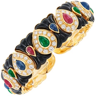 Lot 21 - Two-Color Gold, Carved Black Onyx, Cabochon Gem-Set and Diamond Bangle Bracelet