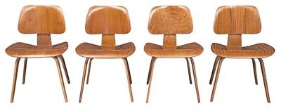 Lot 230 - Set of Four Charles and Ray Eames LCW Chairs...