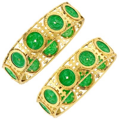 Lot 304 - Pair of High Karat Gold and Carved Jade Bangle Bracelets