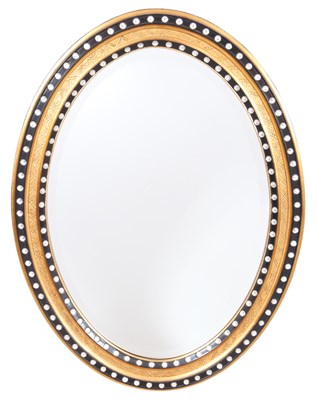 Lot 124 - Irish Parcel Gilt and Ebonized Mirror The oval...