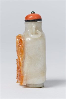Lot 302 - Chinese Celadon and Russet Jade Snuff Bottle...