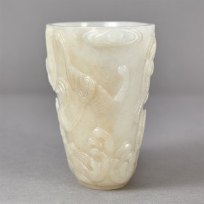 Lot 81 - Chinese White and Russet Jade Libation Cup The...