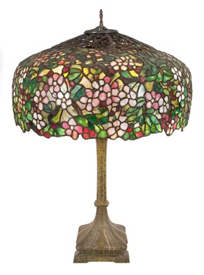 Lot 566 - Tiffany Style Leaded Glass and Green Patinated...