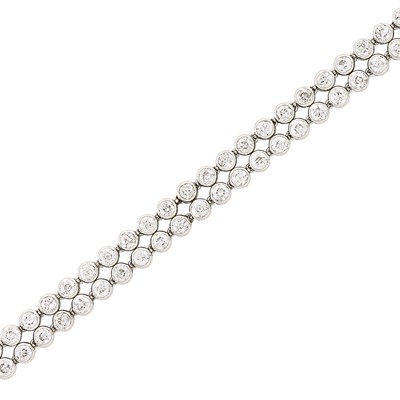 Lot 293 - Double Strand Platinum and Diamond Bracelet