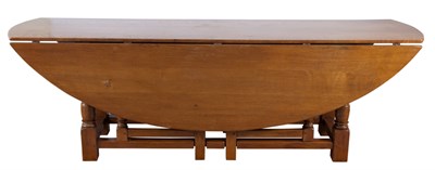 Lot 122 - Jacobean Style Oak Oval Gate-Leg Drop-Leaf...