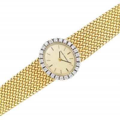 Lot 290 - Two-Color Gold and Diamond Wristwatch, Girard Perregaux