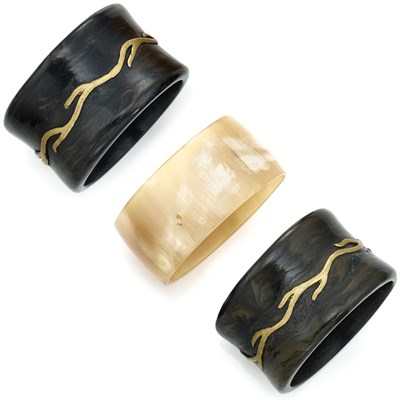 Lot 210 - Three Acrylic Bangle Bracelets