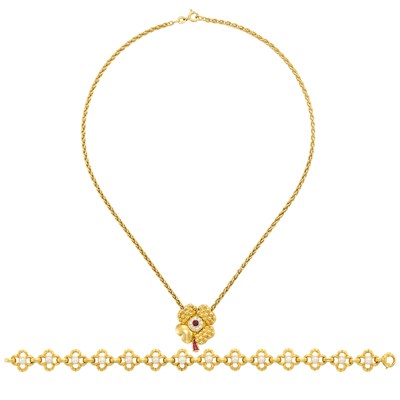 Lot 597 - Gold and Cultured Pearl Bracelet, France, and Gold, Diamond and Ruby Pendant-Brooch, Fred, France, with Chain Necklace