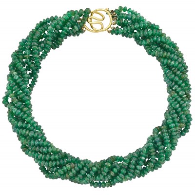 Lot 374 - Seven Strand Emerald Bead Torsade Necklace with Gold Clasp