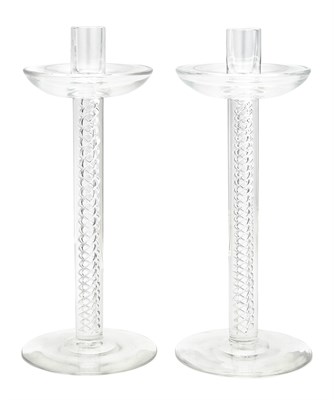 Lot 304 - Pair of Steuben Glass Air Twist Candlesticks...