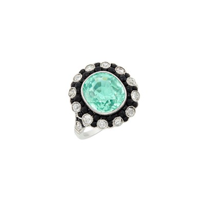 Lot 324 - Platinum, Paraiba Tourmaline, Diamond and Black Onyx Ring
