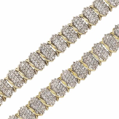 Lot 54 - Pair of Two-Color Low Karat Gold and Diamond Bracelets