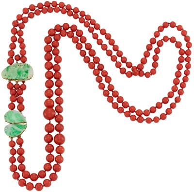 Lot 513 - Long Double Strand Oxblood Coral Bead and Carved Jade Necklace