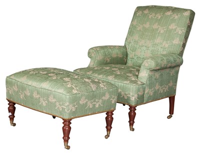 Lot 139 - Upholstered Club Chair and Ottoman The padded...