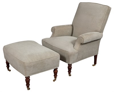 Lot 137 - Upholstered Club Chair and Ottoman The padded...