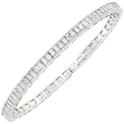 Lot 54 - White Gold and Diamond Bangle Bracelet