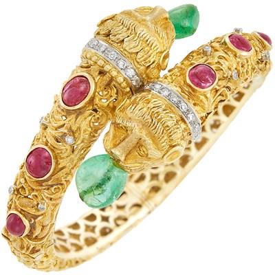 Lot 631 - Gold, Emerald Bead, Cabochon Ruby and Diamond Animal Head Bangle Bracelet, Zolotas