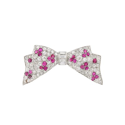 Lot 442 - Platinum, Cabochon Ruby and Diamond Bow Pin