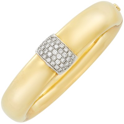 Lot 553 - Two-Color Gold and Diamond Bangle Bracelet
