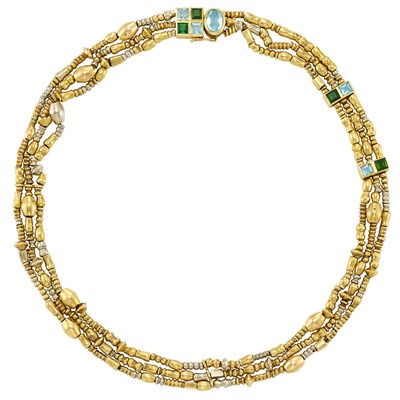 Lot 320 - Triple Strand Two-Color Gold and Gem-Set Necklace, Manfredi