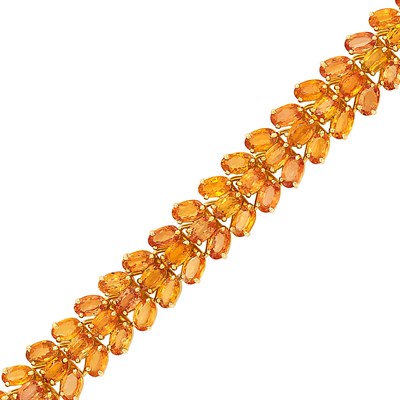 Lot 291 - Gold and Orange Sapphire Bracelet