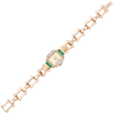 Lot 230 - Rose Gold, Platinum, Emerald and Diamond Wristwatch