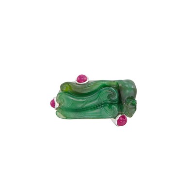 Lot 286 - Carved Jade, White Gold and Cabochon Ruby Saddle Ring