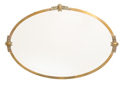 Lot 143 - Art Deco Brass Mirror Of oval form. Height 22...
