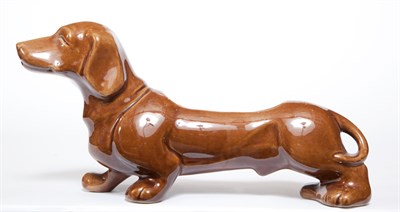 Lot 232 - Brown Glazed Ceramic Daschund-Form Jardiniere...