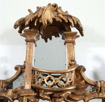 Lot 411 - George II Giltwood Pier Mirror The shaped...