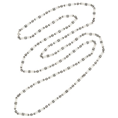 Lot 475 - Long Art Deco Platinum, Frosted Rock Crystal, Black Enamel and Diamond Link Necklace