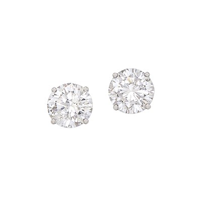 Lot 304 - Pair of White Gold and Laser-Drilled Diamond Stud Earrings