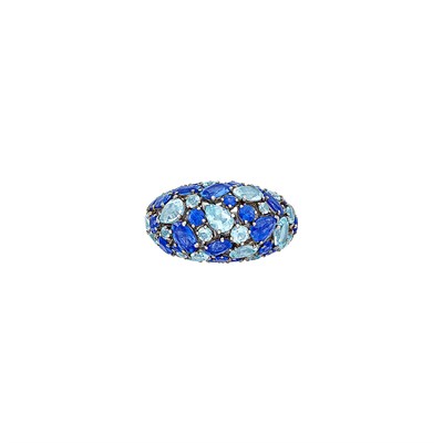 Lot 337 - White and Blackened Gold, Sapphire, Blue Topaz and Diamond Bombé Ring