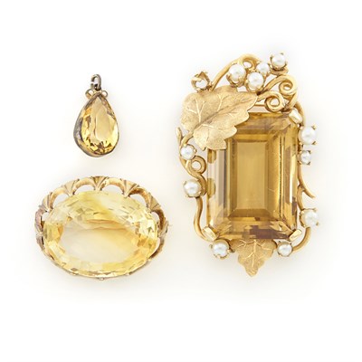 Lot 2080 - Two Gold and Citrine Brooches and Charm